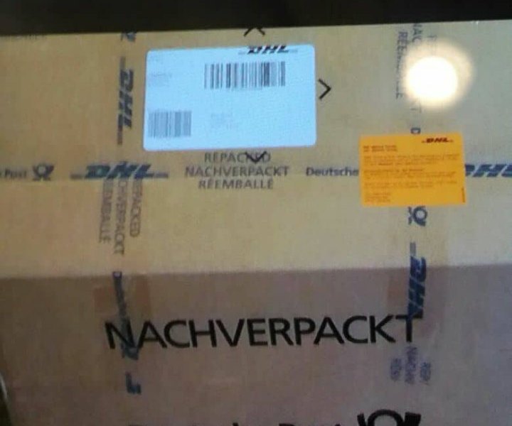 Paket-DHL-Post-Nachverpackt-Umgepackt.jpg