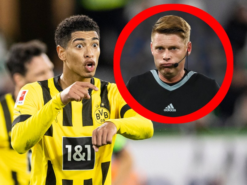 Jude Bellingham, Profi von Borussia Dortmund, zeigt Schiedsrichter Christian Dingert ein Handspiel an.