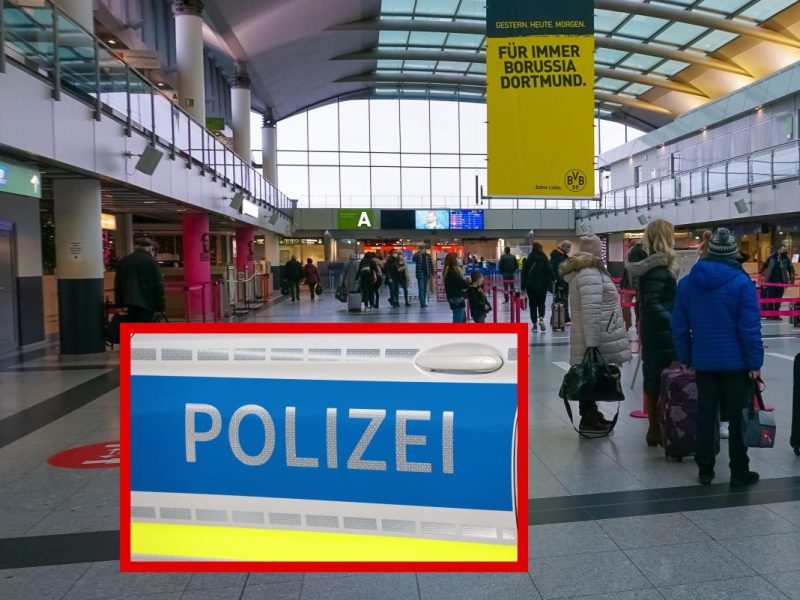 Flughafen Dortmund Menschen warten in Schlangen Polizeisymbolbild